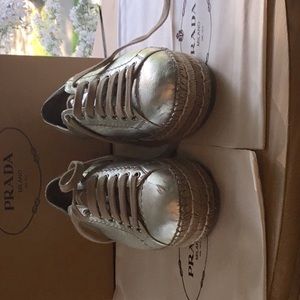 Silver platform tennis shoe for fun wear, one scuff